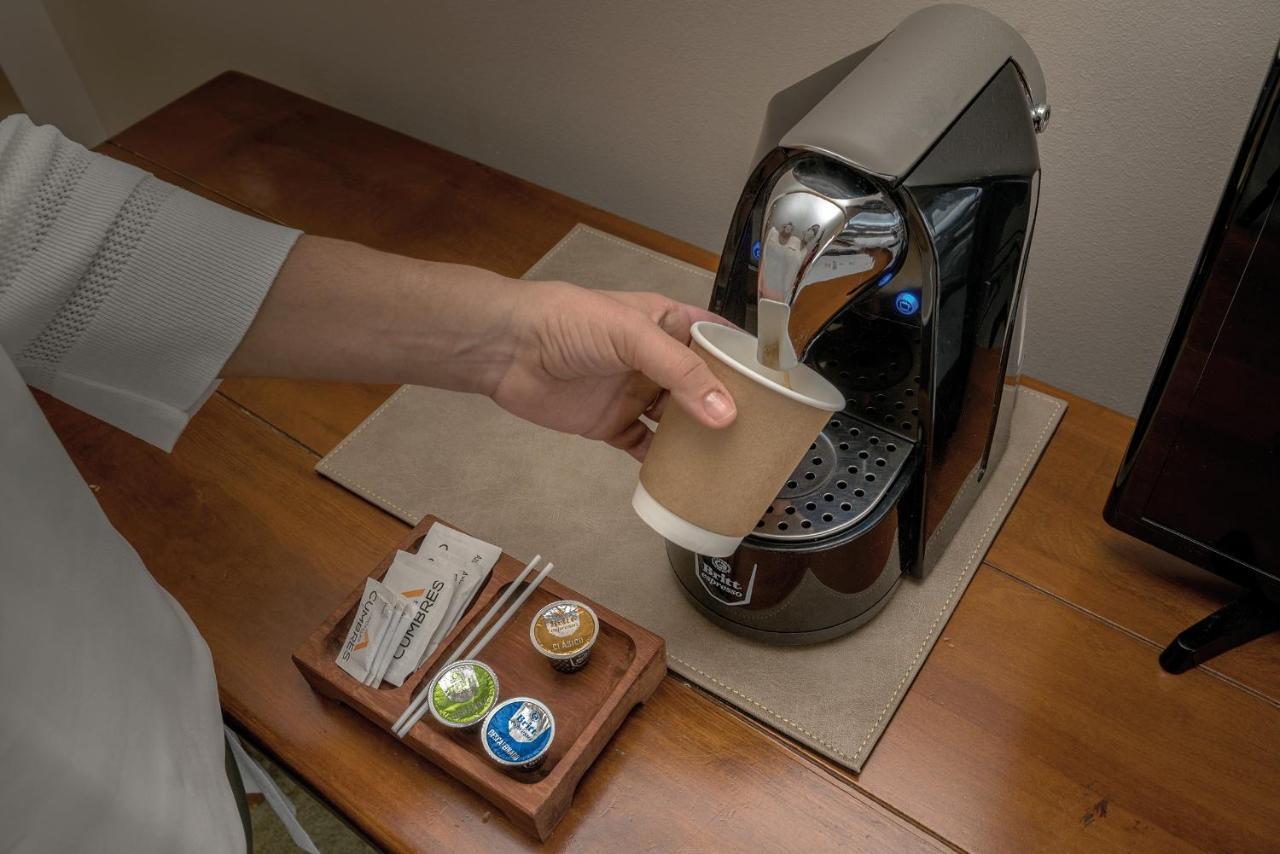 Wyndham Puerto Varas Pettra Εξωτερικό φωτογραφία A Nespresso coffee machine